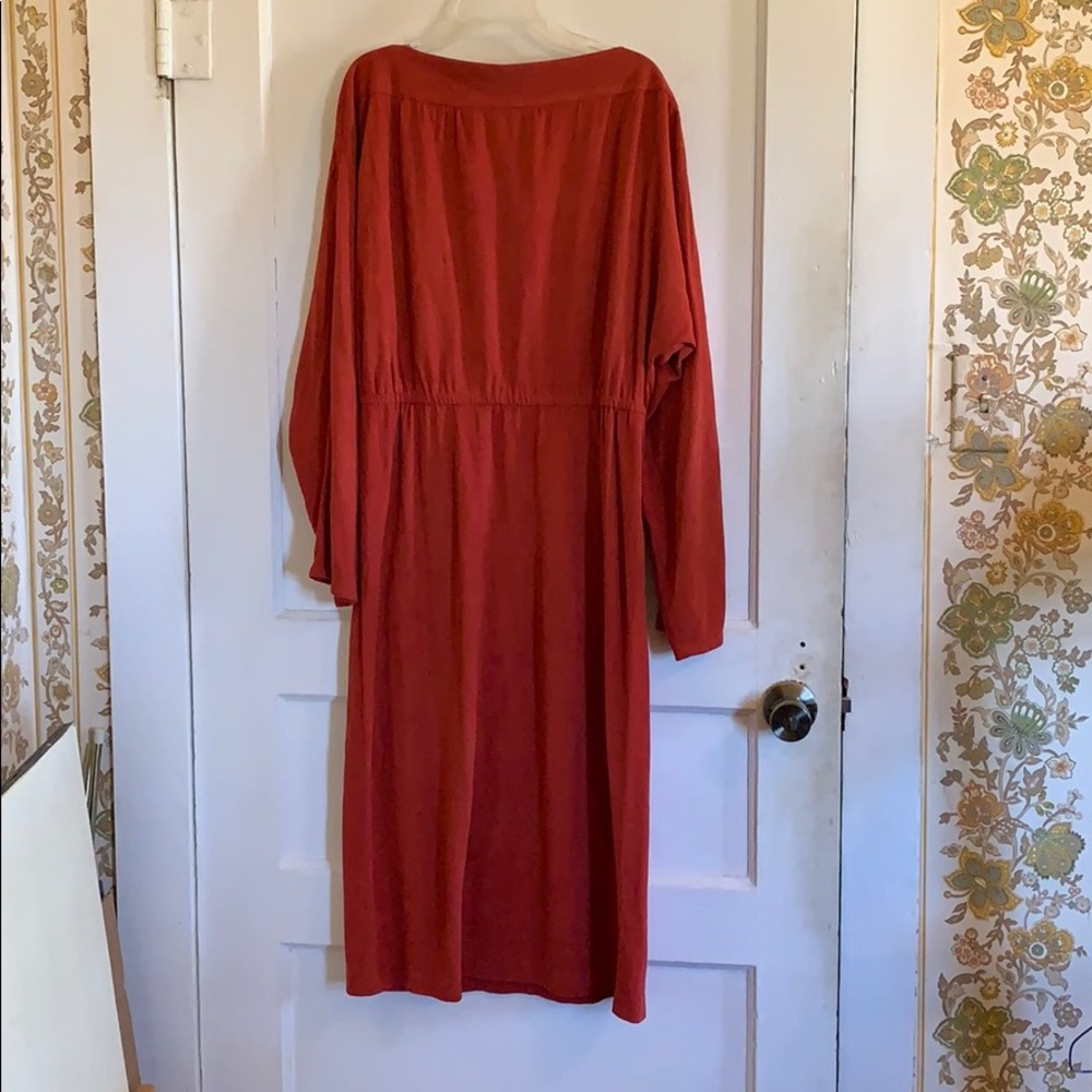 Burnt orange midi-dress.
